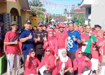 Camat Tanjung Pura Lepaskan Gerak Jalan Sehat di Desa Pematang Tengah