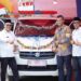 PLN Unit Induk Distribusi Sumbar Serahkan Bantuan 1 Unit Mobil Ambulance ke Nagari Sibarambang