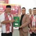 Paslon Bupati dan Wakil Bupati Langkat, Iskandar Sugito, S.Pd, M.M., dan Adli Tama Hidayat Sembiring, S.AB, M.Sc, mendaftar ke KPUD Langkat. (Red-Dberita.id)